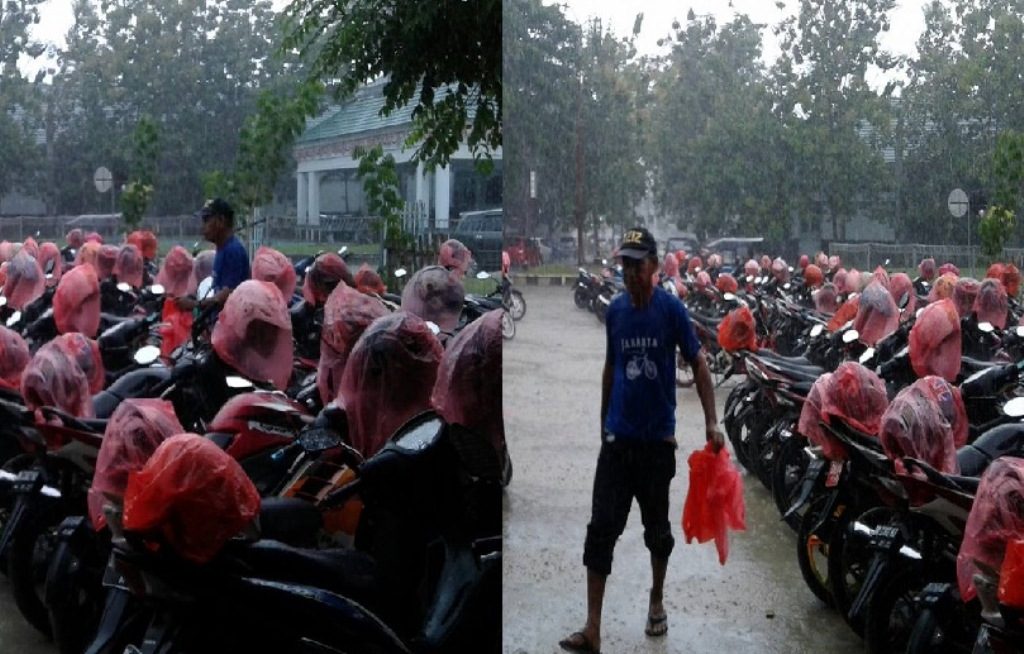 Lakukan Hal yang Langka dan Mengagumkan, Tukang Parkir di Gorontalo ini Viral