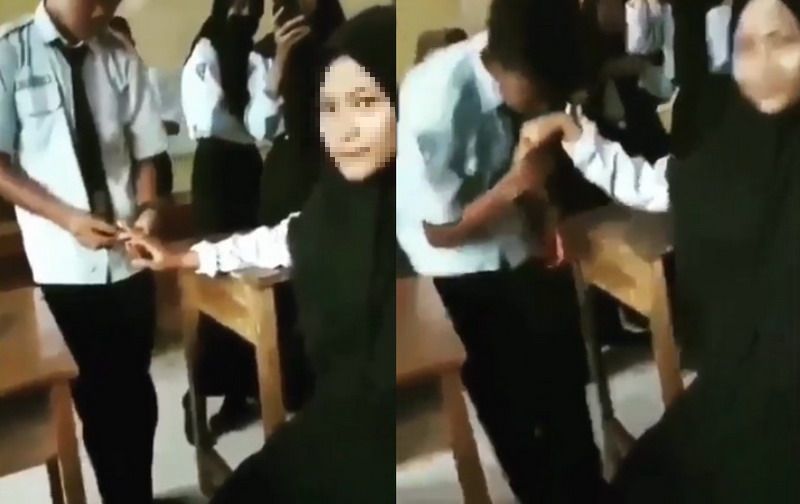 Viral Pelajar Pasang Cincin Lambang "Jadian" Bikin Jiwa Para Jomblo Meronta